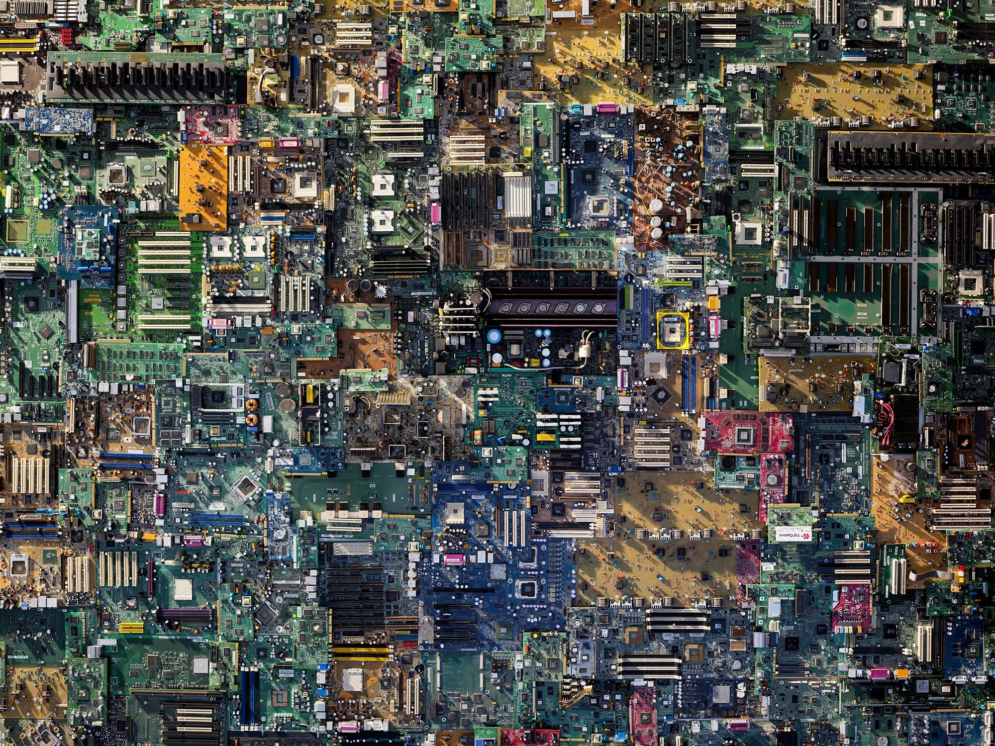 Electronics art print featuring a colourful arrangement of computer motherboards and circuit boards