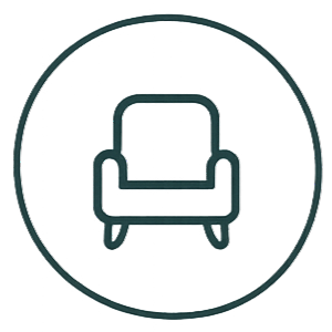 Icon of an armchair inside a circle.