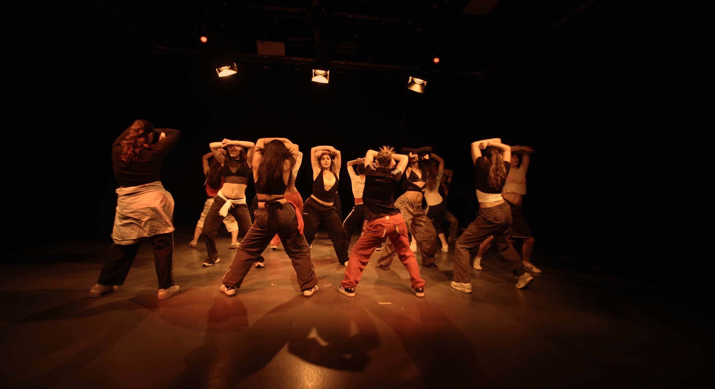 Shake it to the Max Choreography Solo Dancer Red Orange Cinematic Lighting Large Group