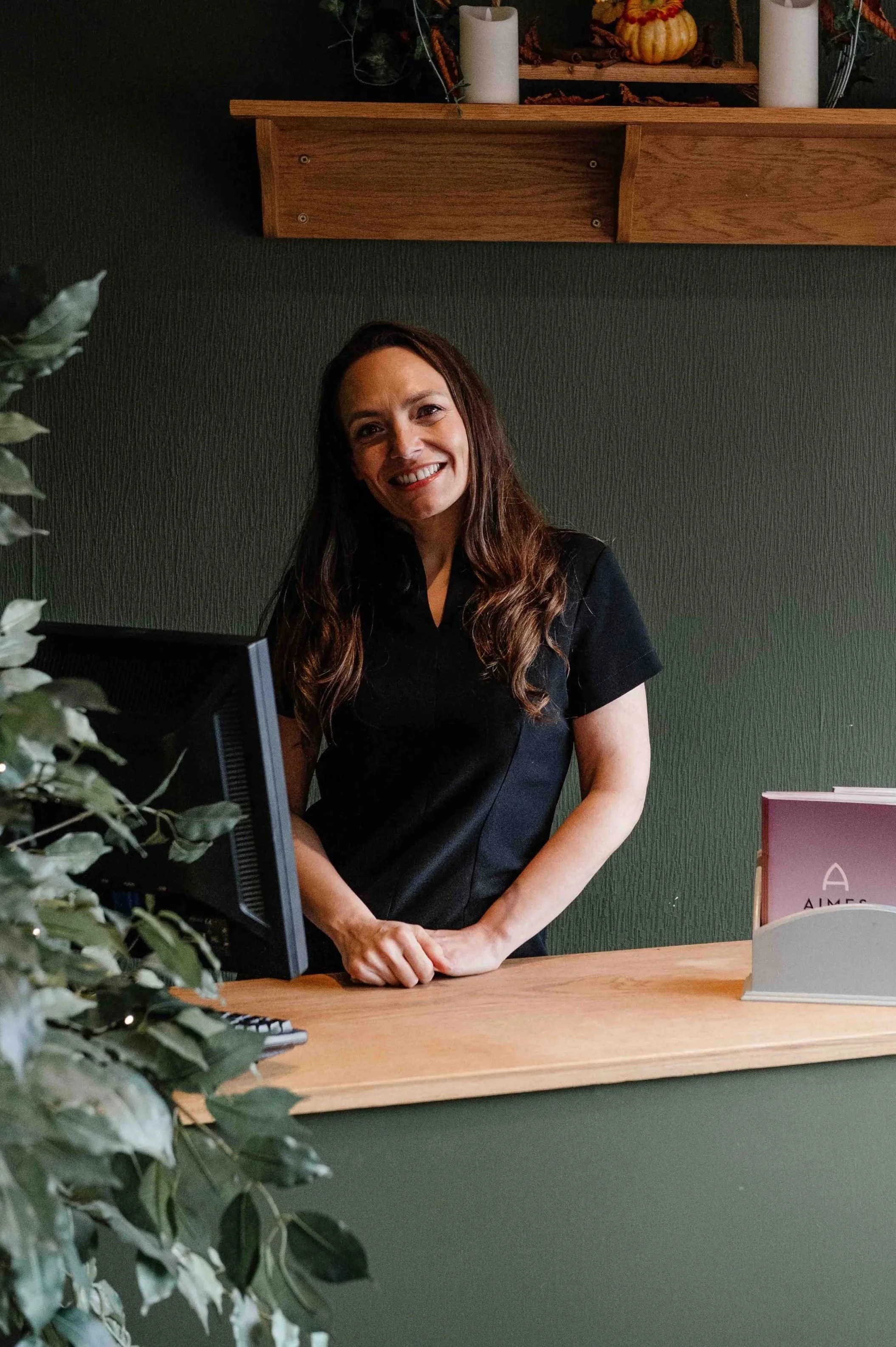 Amy, founder of Aimes Health & Beauty, welcoming clients at the salon reception in Knaresborough