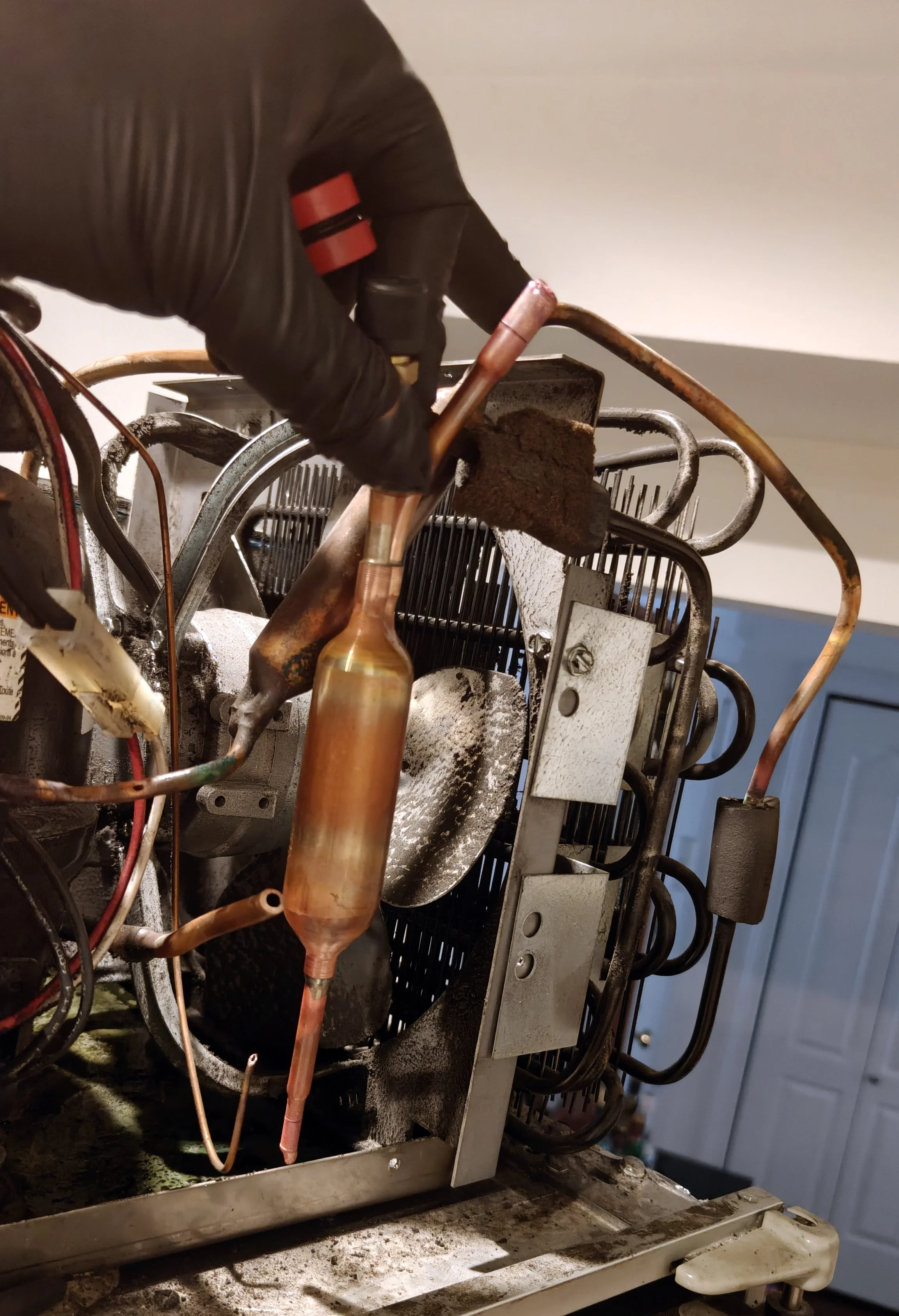 Brazing a refrigerant line filter drier
