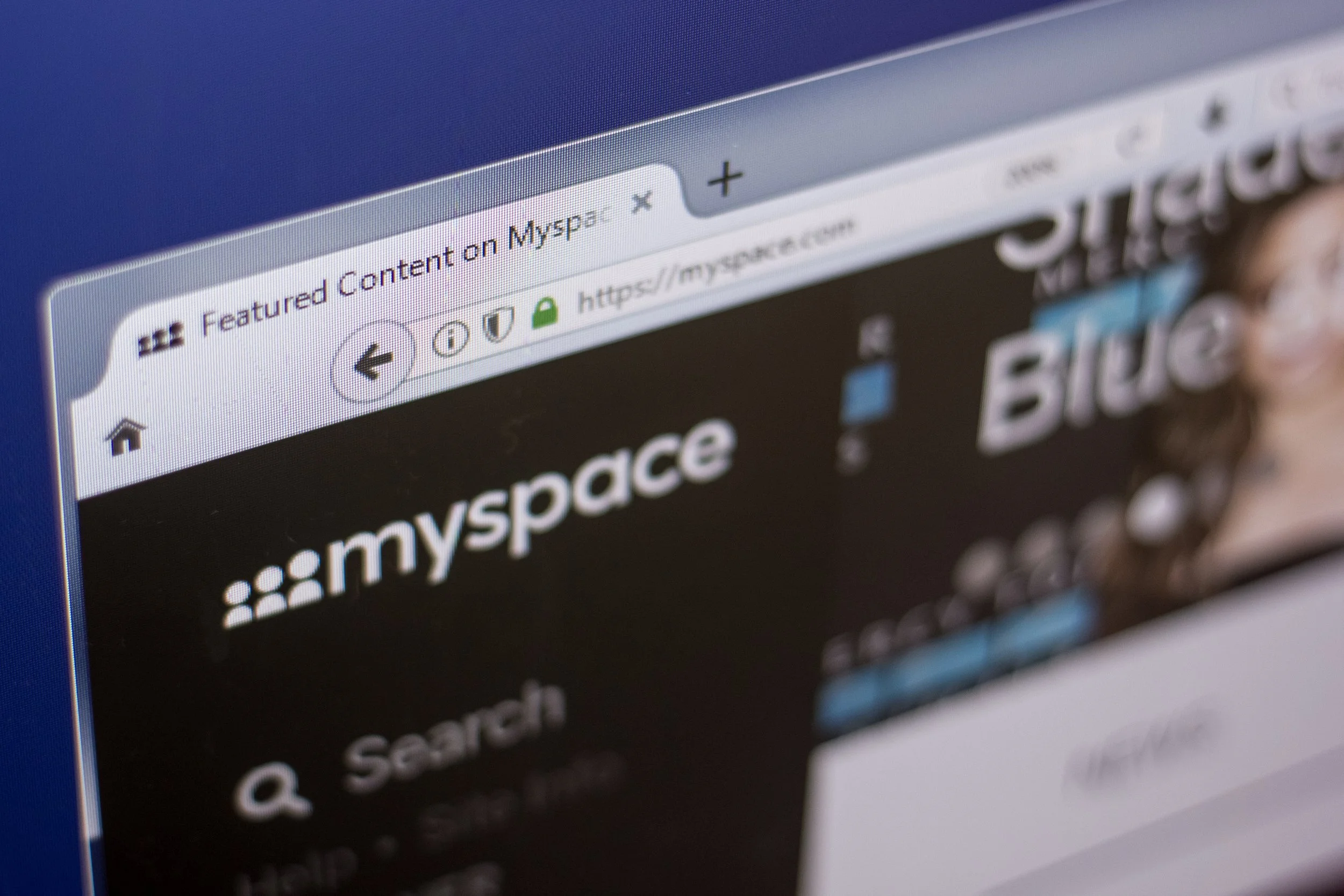 Close-up of a computer screen showing a browser tab open to the Myspace homepage, with the address bar reading https://myspace.com.