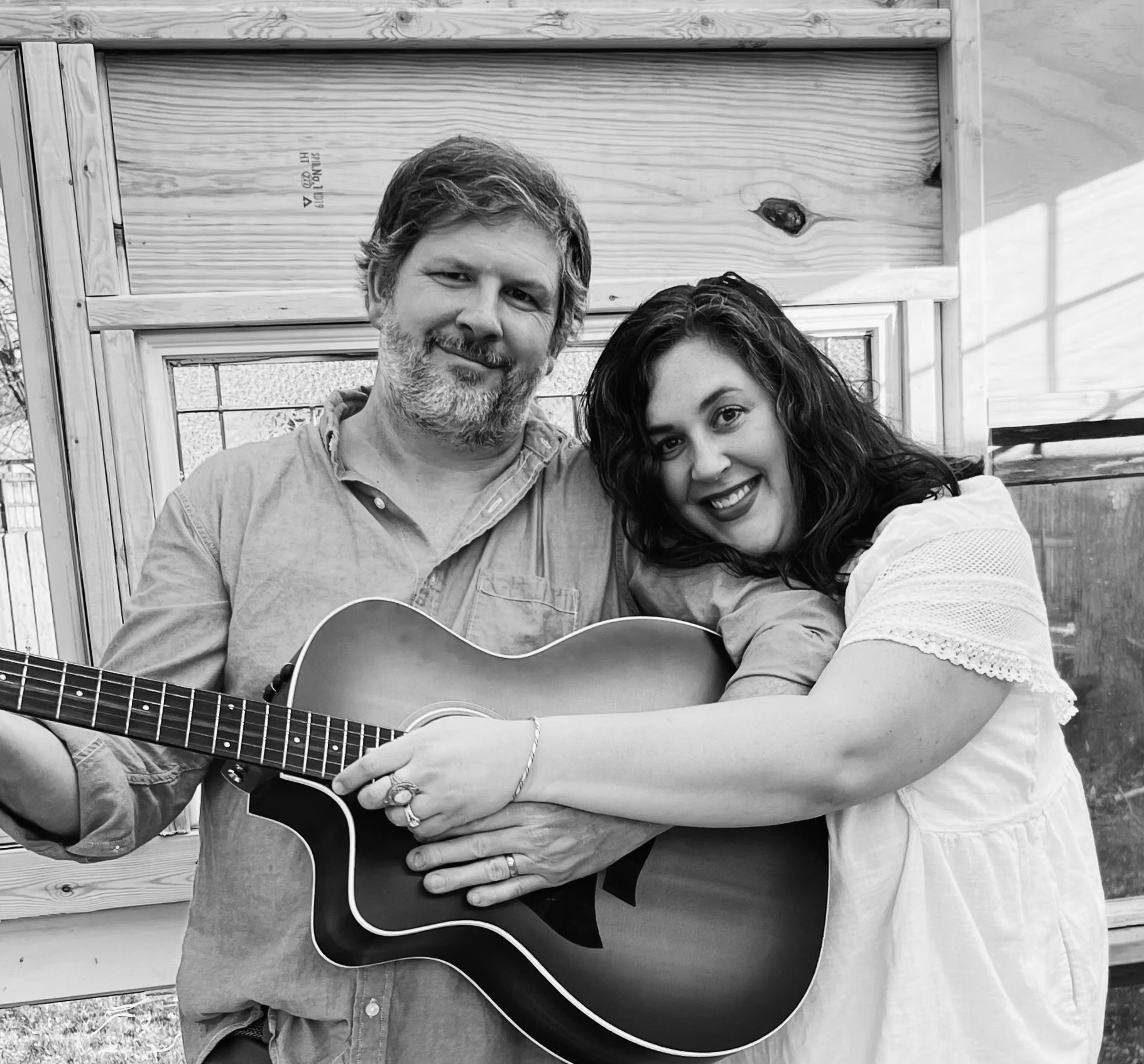 Aaron Lipp and Caroline Lipp of The Wandering Tulipps, an Indiana husband-and-wife folk duo known for rich vocal harmonies, heartfelt songwriting, and acoustic performances.
