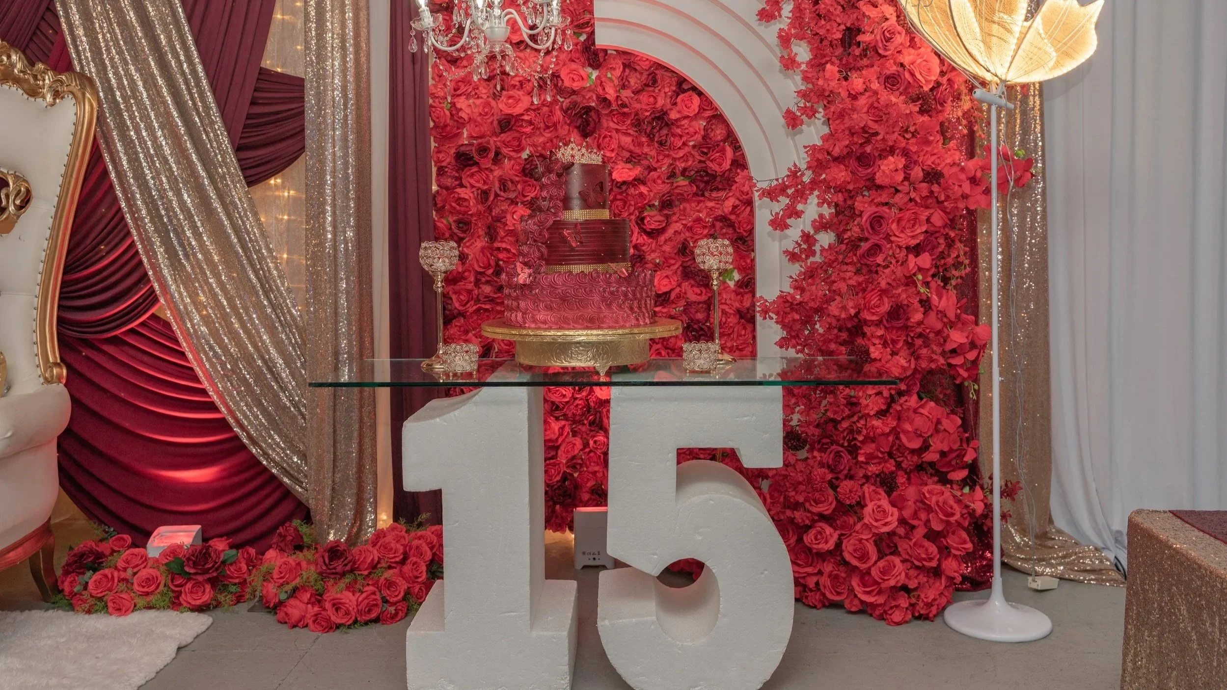 A red birthday cake over the numbers 15