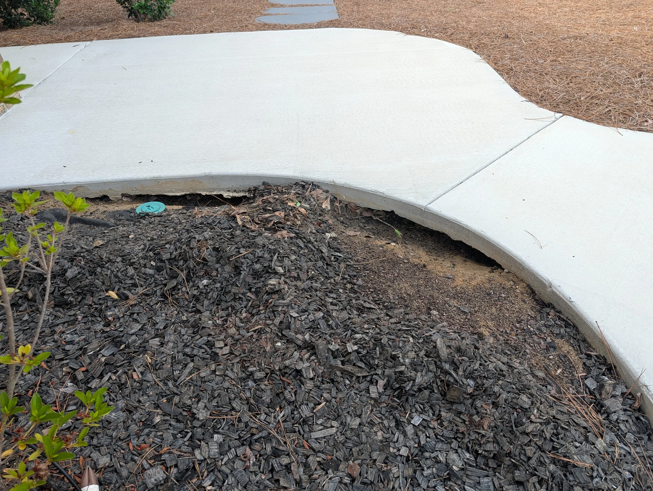 Improperly designed and installed driveway and sidewalk leads to voids and eventual cracking requiring a fix or replacement