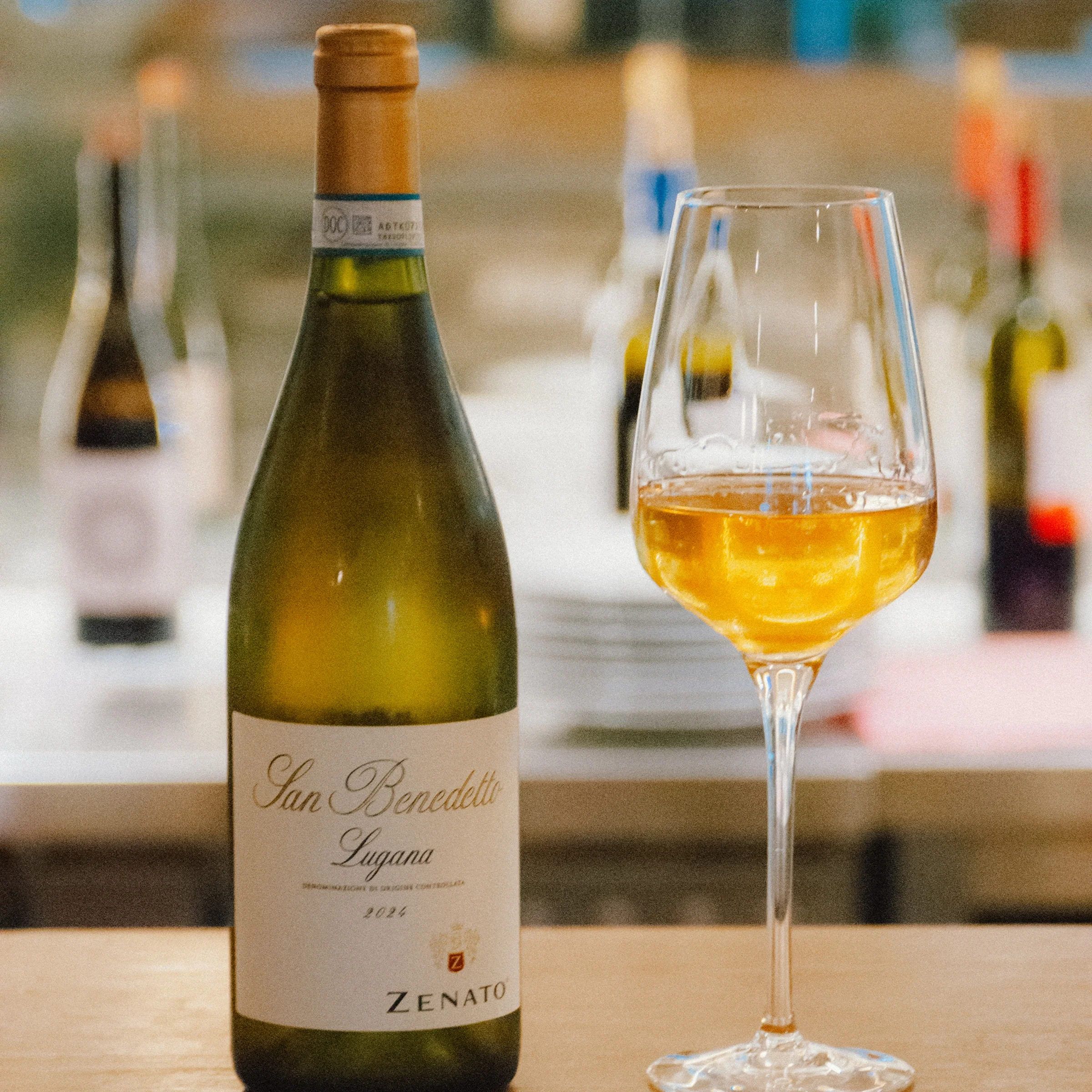 Zenato San Benedetto Lugana DOC 2024 poured at VERA's bar in Porto, part of an all-Italian wine list.