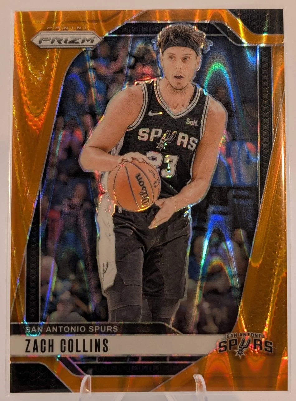 Front of 2024-25 Panini Prizm #197 Zach Collins Prizms Orange Seismic #/199