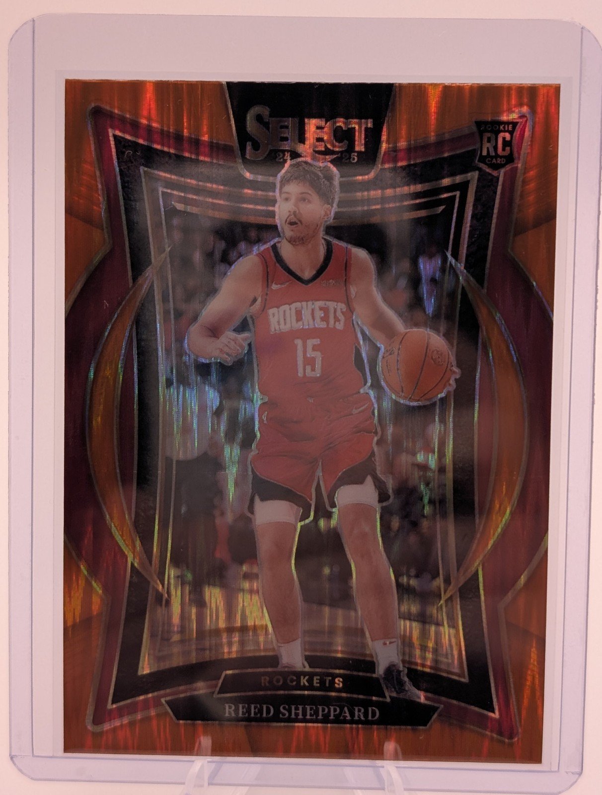 Front of 2024-25 Panini Select #68 Reed Sheppard Orange Flash Prizm Rookie (RC)