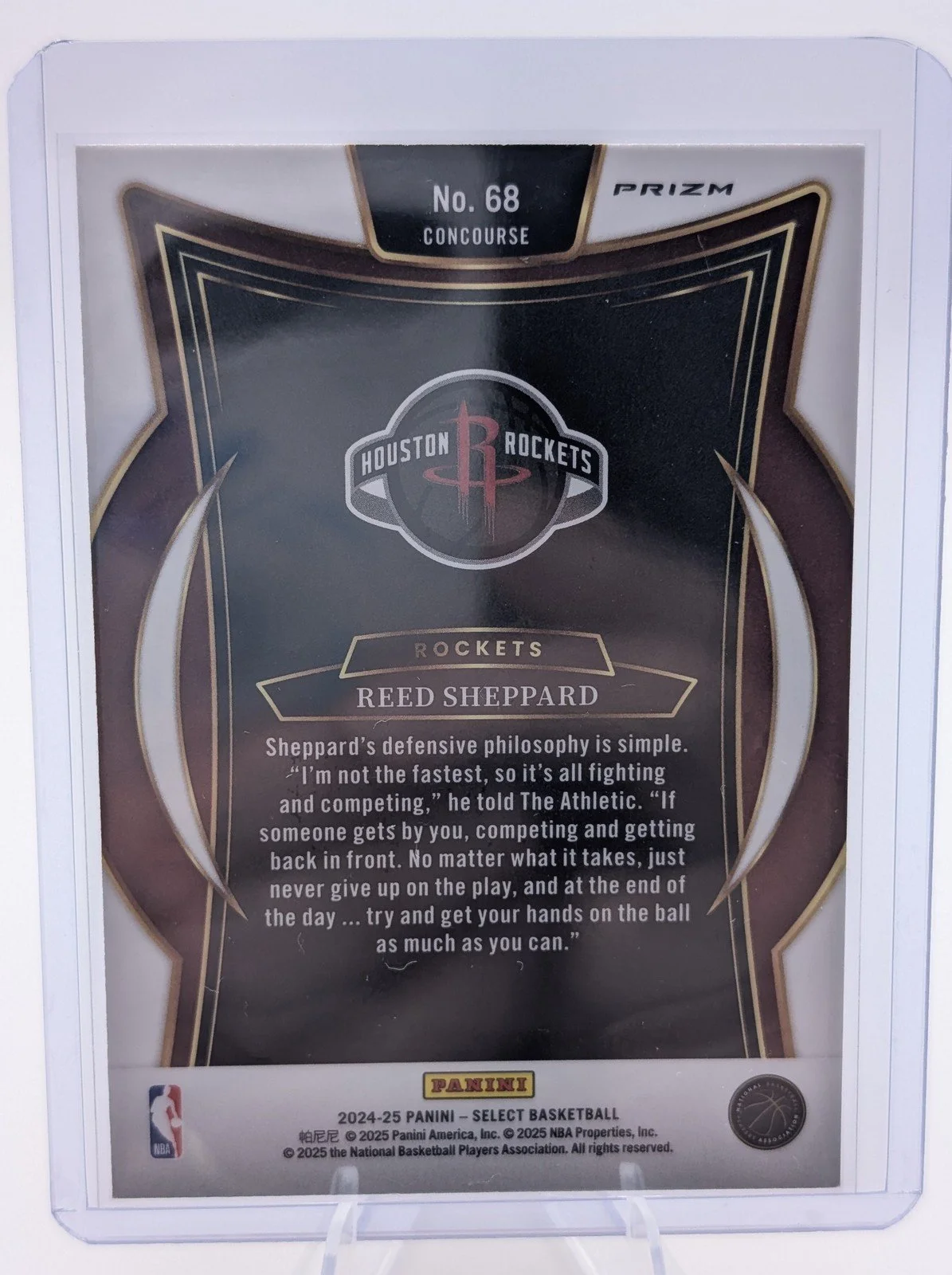 Back of 2024-25 Panini Select #68 Reed Sheppard Orange Flash Prizm Rookie (RC)