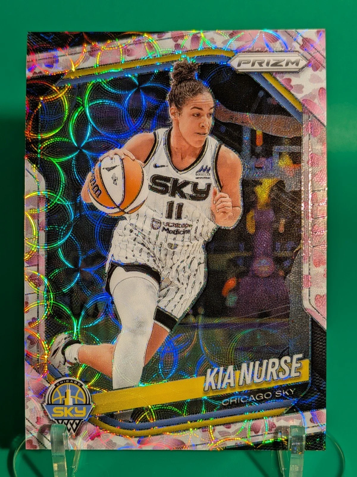 Front of 2025 Panini Prizm WNBA #24 Kia Nurse Cherry Blossoms Prizms FOTL #/20