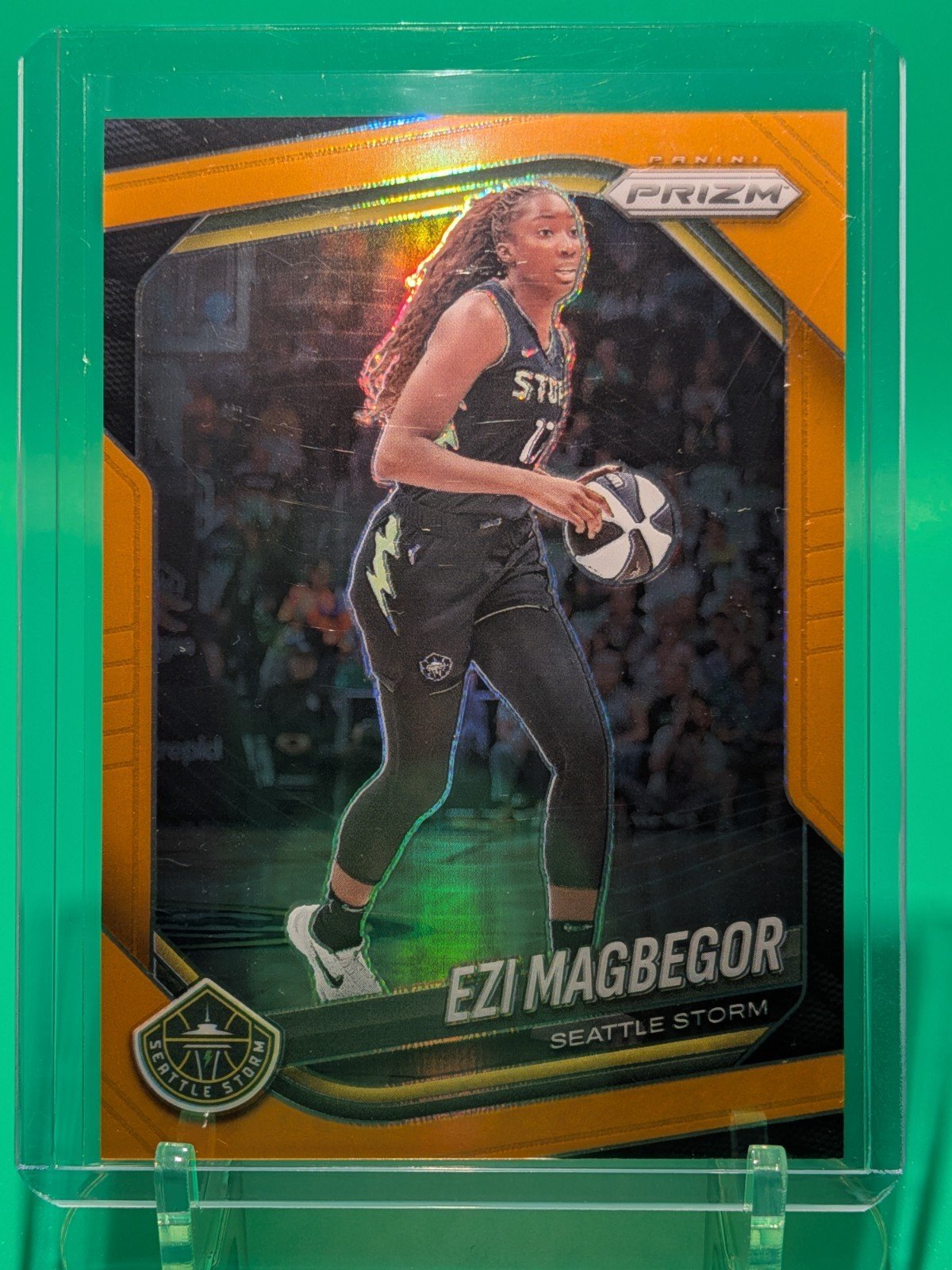 Front of 2025 Panini Prizm WNBA #36 Ezi Magbegor Orange Prizms #/99