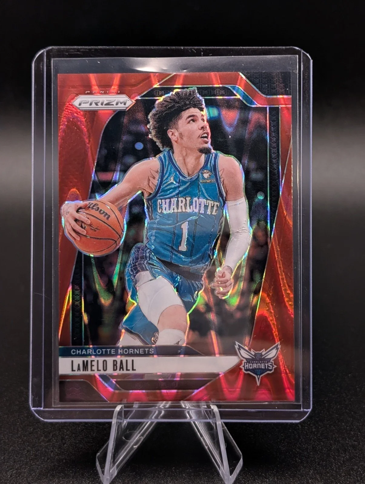 Front of 2024-25 Panini Prizm #30 LaMelo Ball Prizms Red Seismic #/299