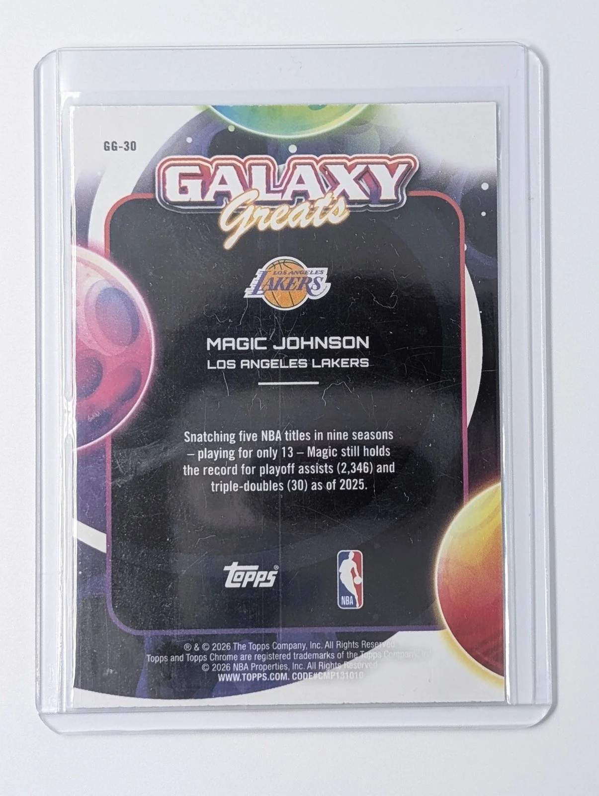 Back of 2025 Topps Cosmic Chrome GG-30 Magic Johnson /75 Galaxy Greats Green Space Dust