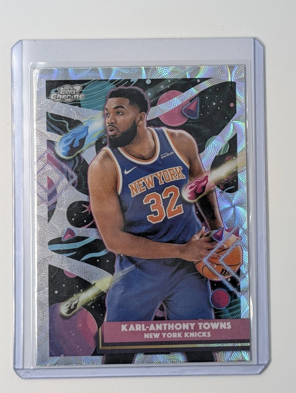 Front of 2025-26 Topps Cosmic Chrome #167 Karl-Anthony Towns Nucleus Refractor Knicks
