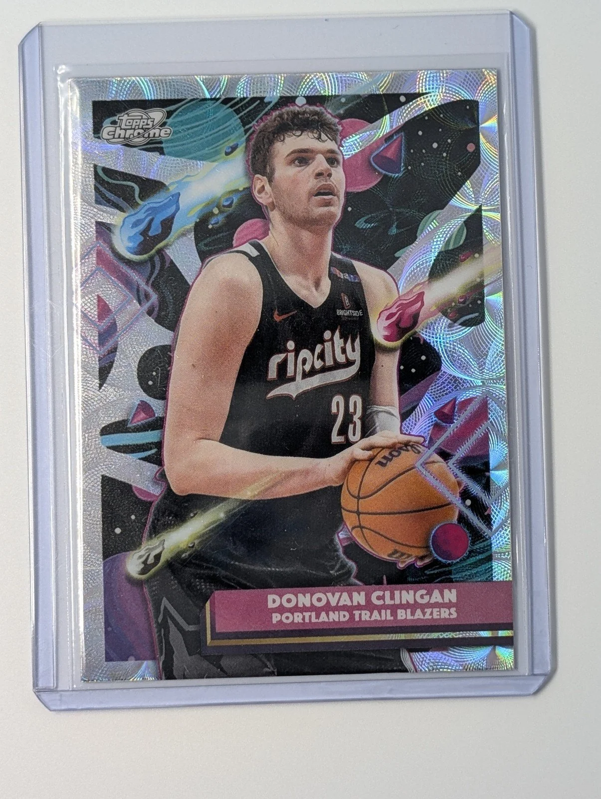 Front of 2025-26 Topps Chrome Cosmic #191 Donovan Clingan Nucleus Refractor