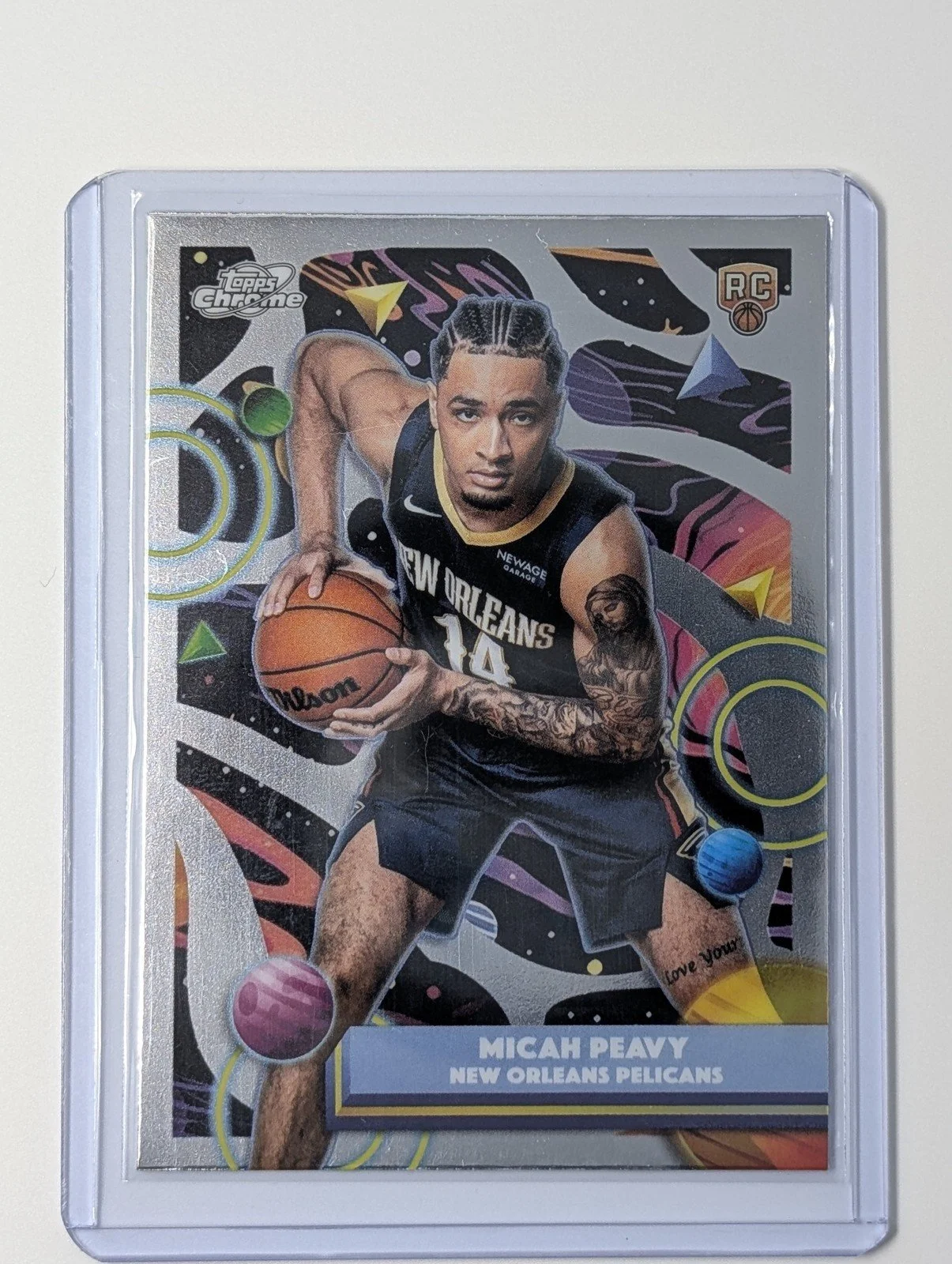 Front of 2025-26 Topps Chrome Cosmic #127 Micah Peavy Rookie RC