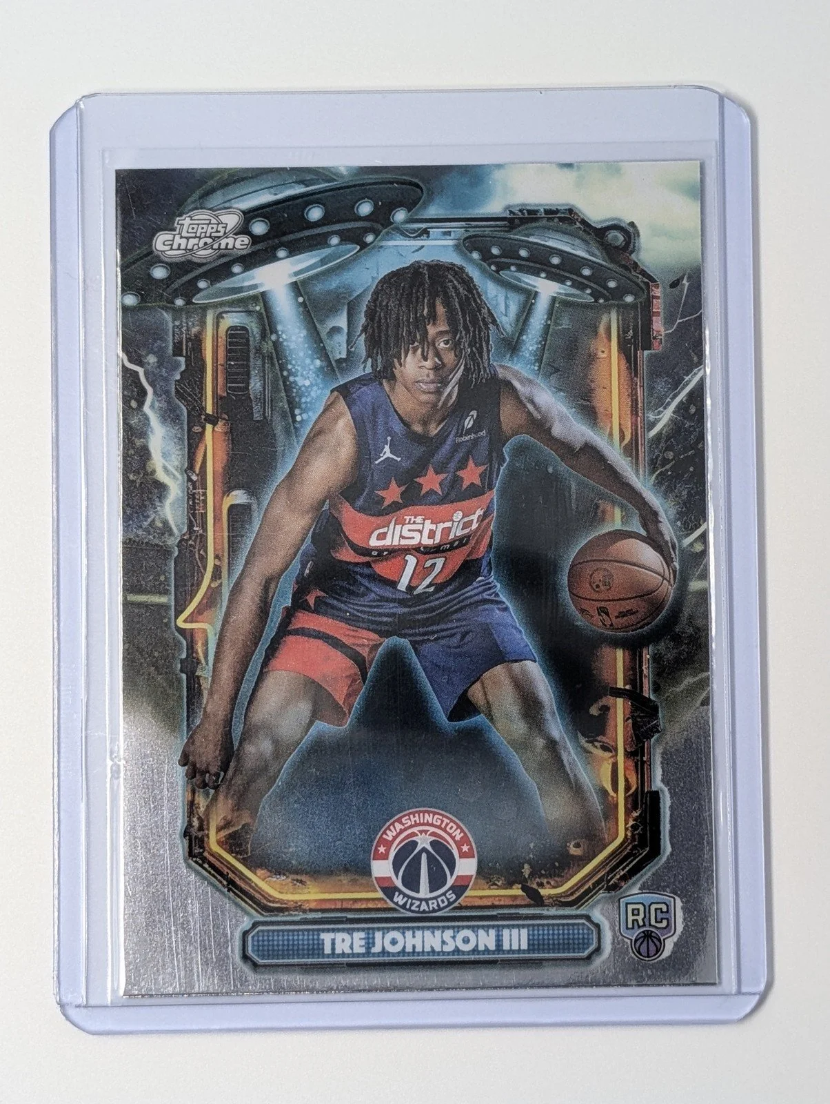 Front of 2025-26 Topps Chrome Cosmic #115 Tre Johnson III ET-16 Rookie RC