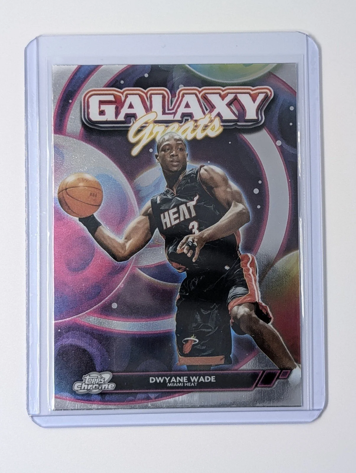Front of 2025-26 Topps Chrome Cosmic GG-4 Dwyane Wade Galaxy Great
