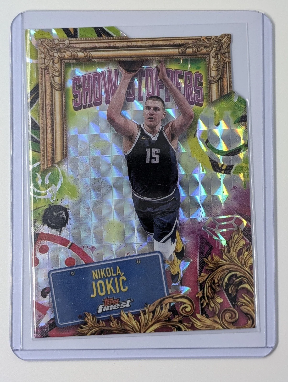 Front of 2024-25 Finest #S-1 Nikola Jokić Showstoppers Die Cut Geometric Refractor