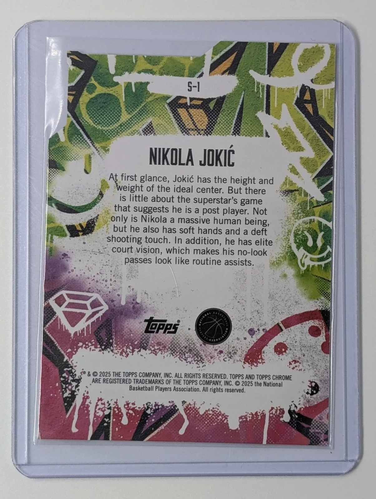 Back of 2024-25 Finest #S-1 Nikola Jokić Showstoppers Die Cut Geometric Refractor