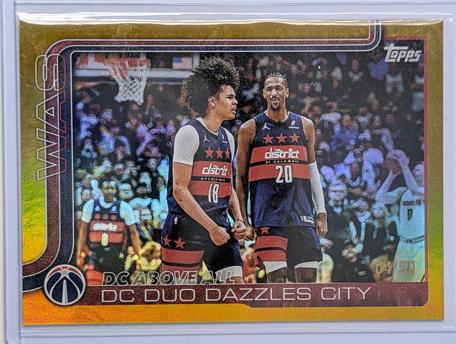 Front of 2025-26 Topps #285 DC Above All: DC Duo Dazzles City /50 Gold Rainbow