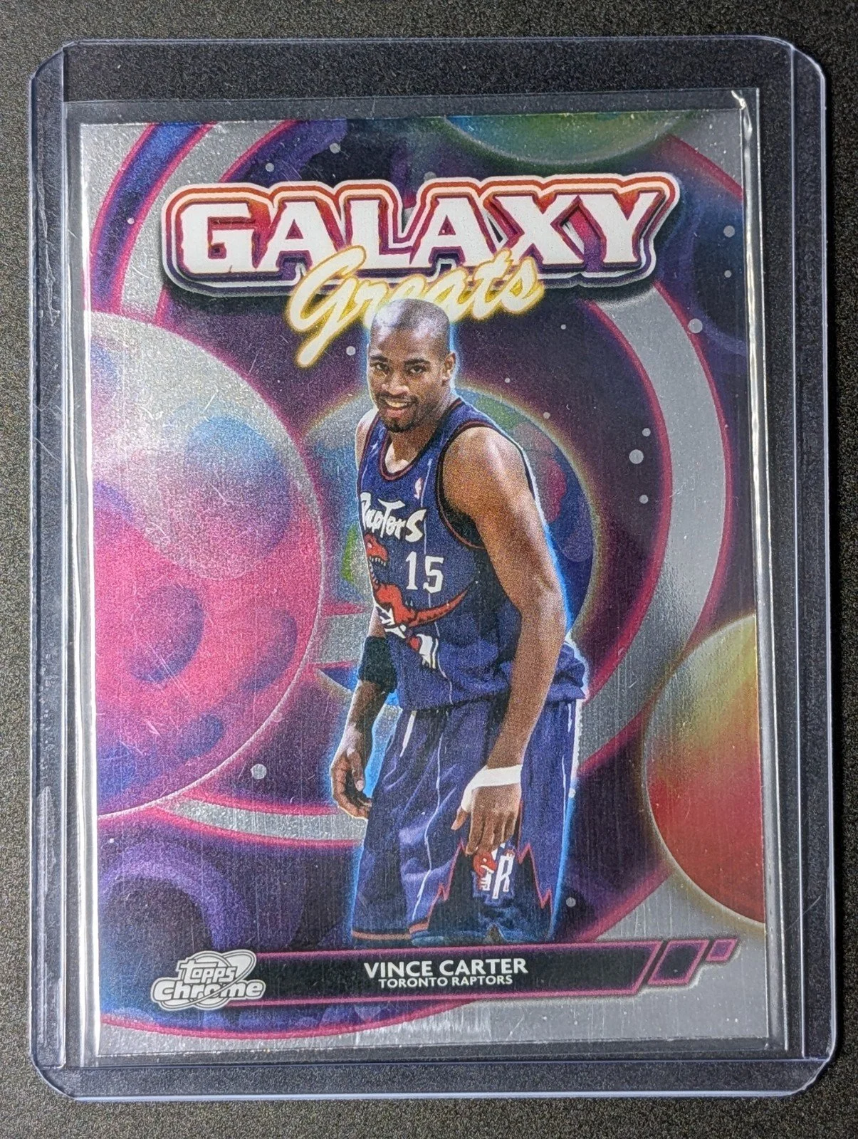 Front of 2025-26 Topps Chrome Cosmic #GG-26 Vince Carter Galaxy Greats