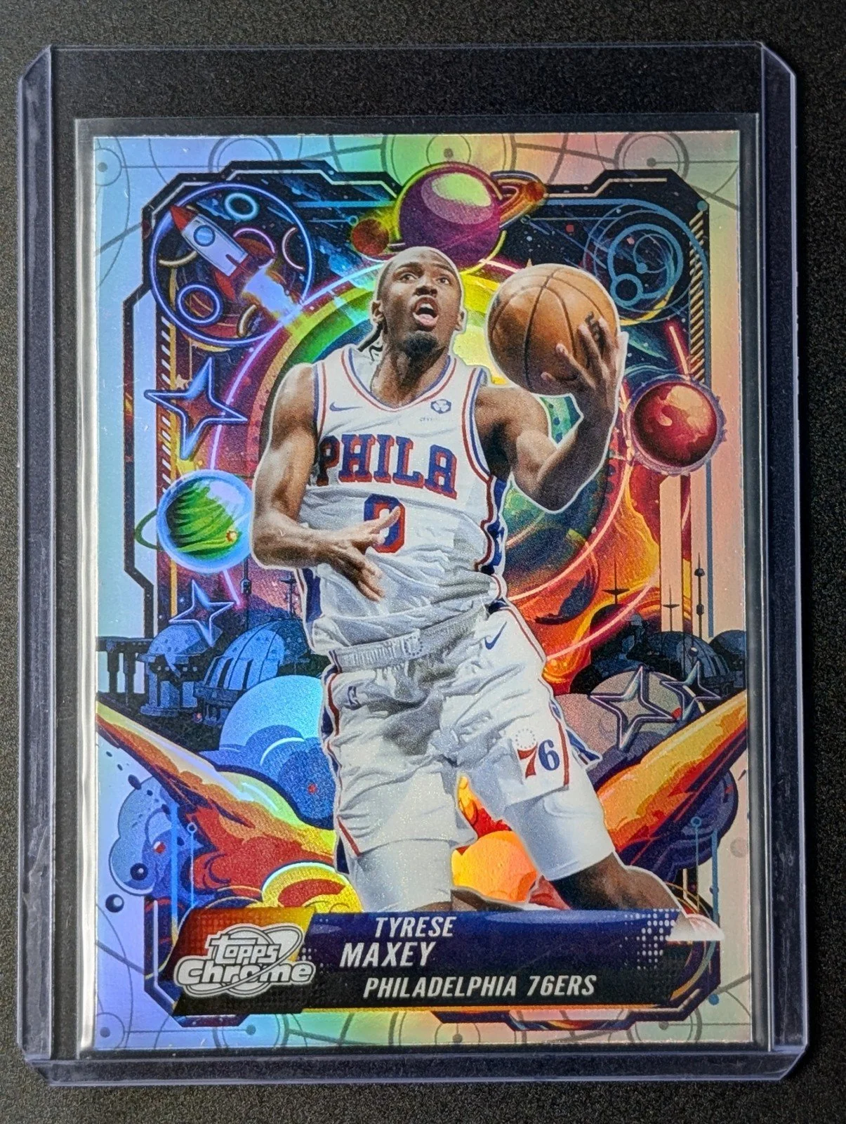 Front of 2025-26 Topps Chrome Cosmic Tyrese Maxey PROPULSION Refractor #PRP-9 76ers
