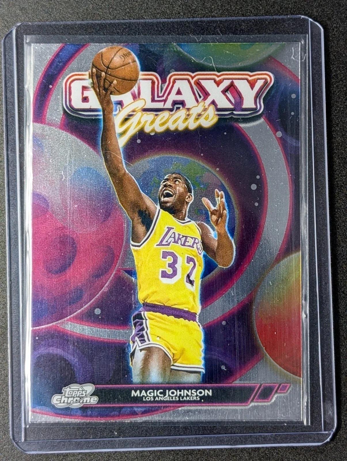Front of 2024-25 Topps Chrome Cosmic #GG-30 Magic Johnson Galaxy Greats