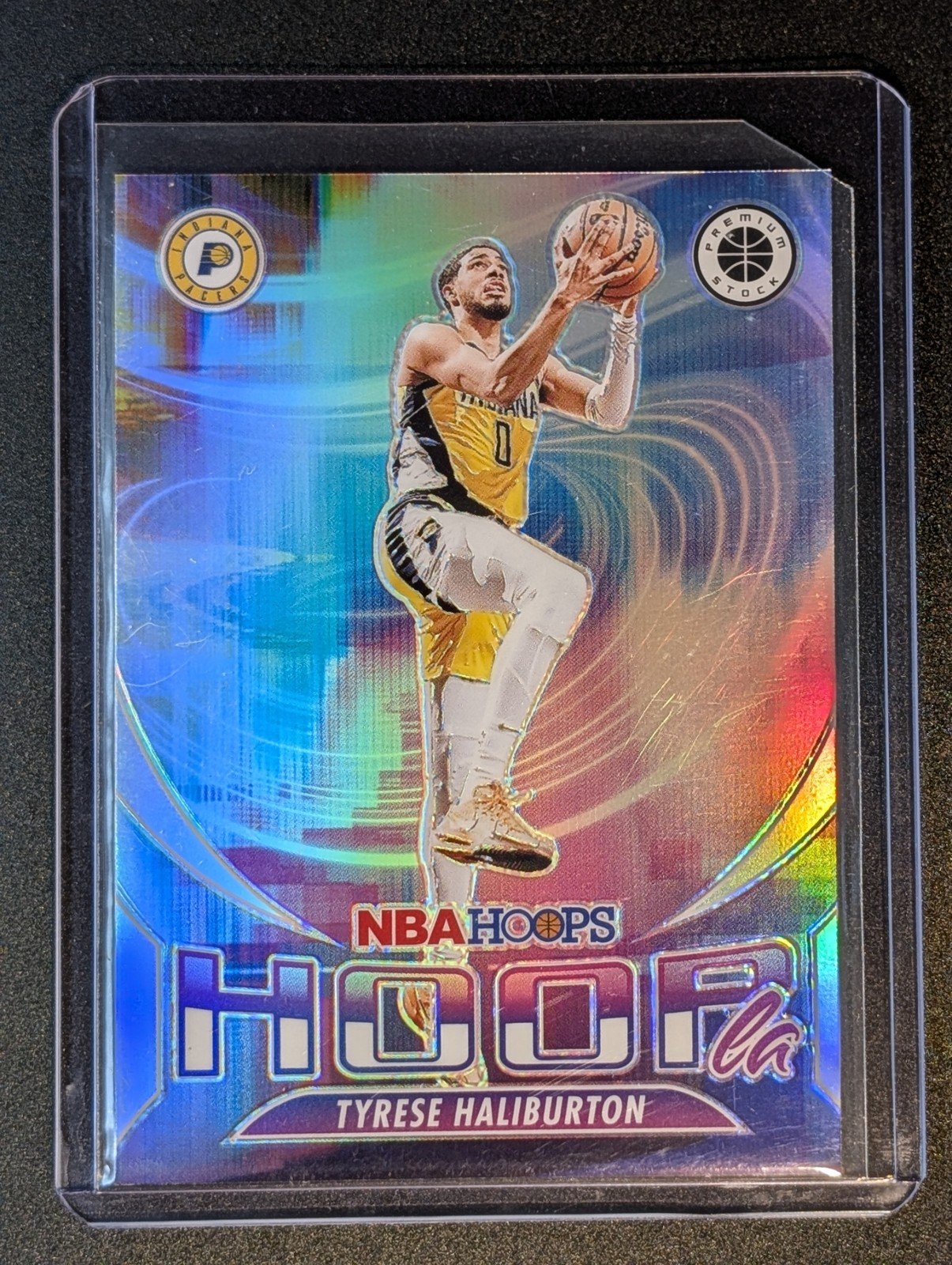 Front of 2023-24 Hoops Premium Stock #11 Tyrese Haliburton Hoopla Silver Prizm