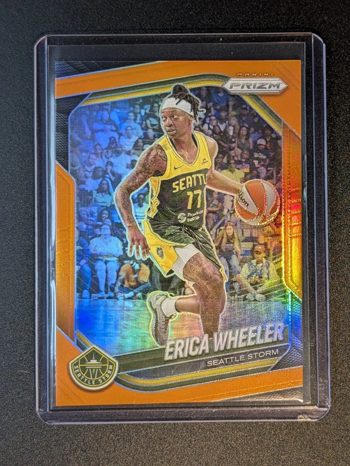 Front of 2025 Panini Prizm WNBA #125 Erica Wheeler Orange Prizms #/99