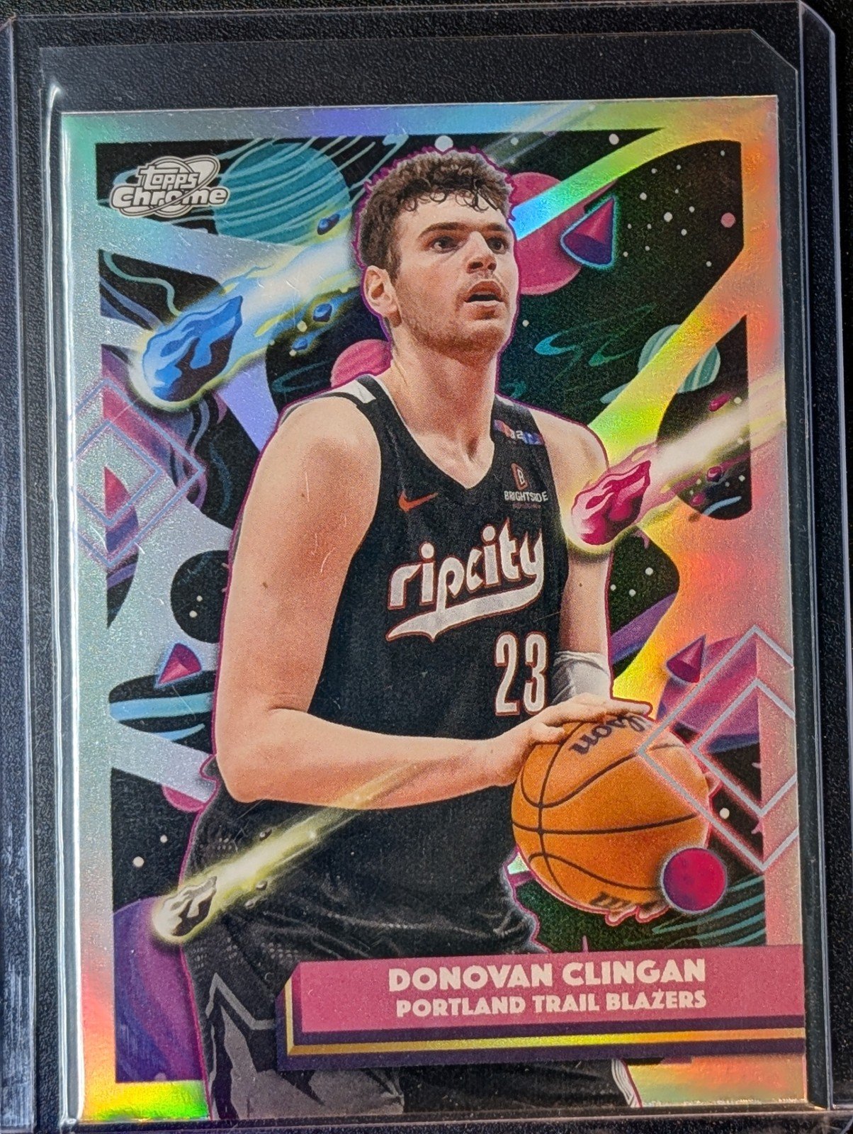 Front of 2025-26 Topps Chrome Cosmic #191 Donovan Clingan Refractor
