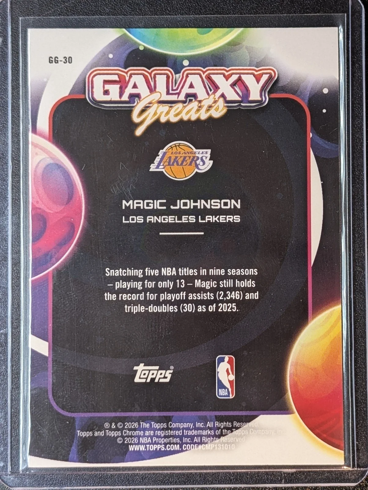 Back of 2025-26 Topps Chrome Cosmic #GG-30 Magic Johnson Galaxy Greats
