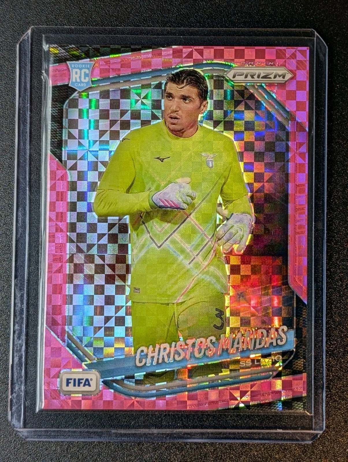 Front of 2025-26 Panini Prizm FIFA #127 Christos Mandas Pink Power Prizms /75 RC