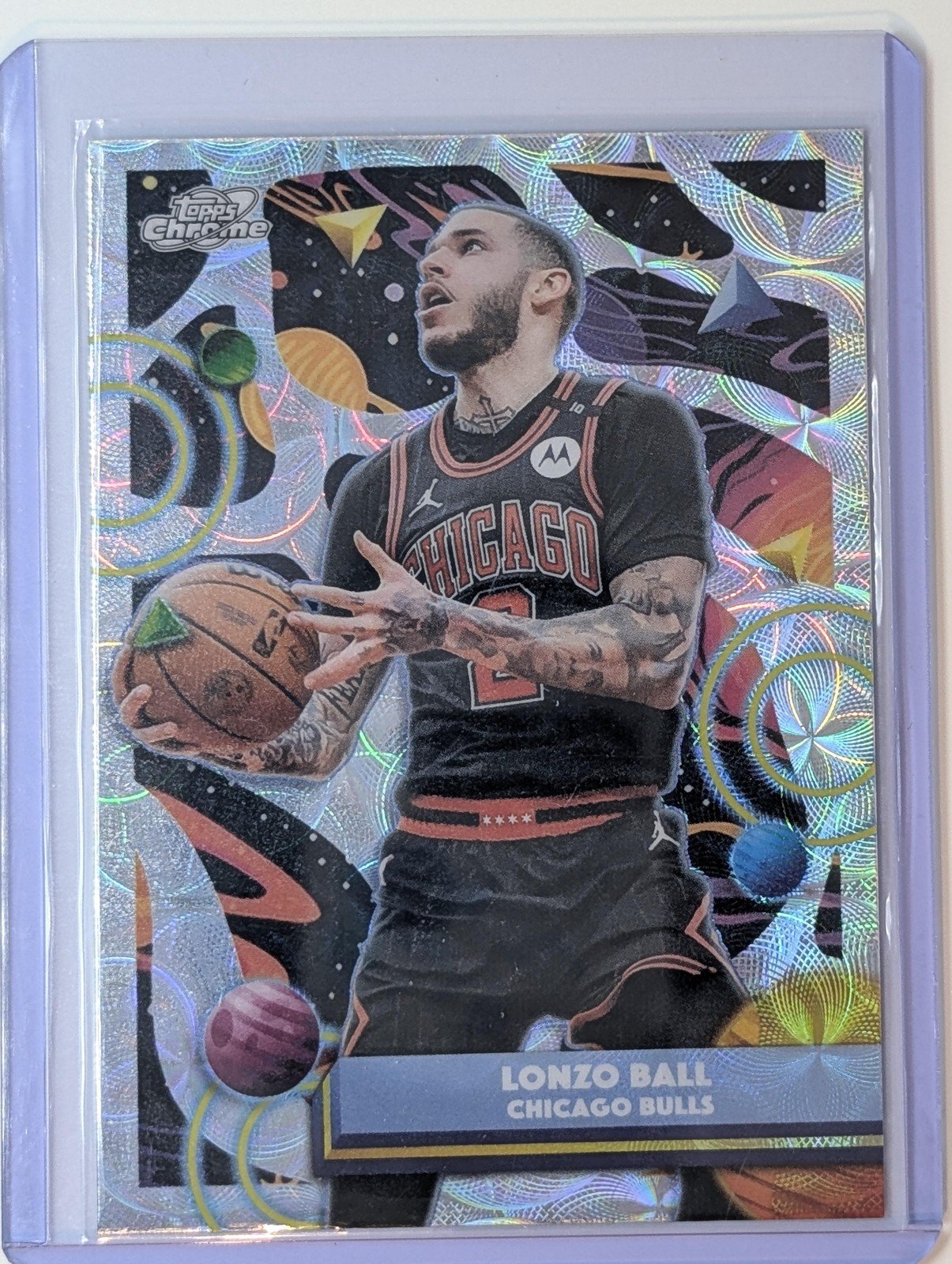 Front of 2025-26 Topps Chrome Cosmic #19 Lonzo Ball Nucleous