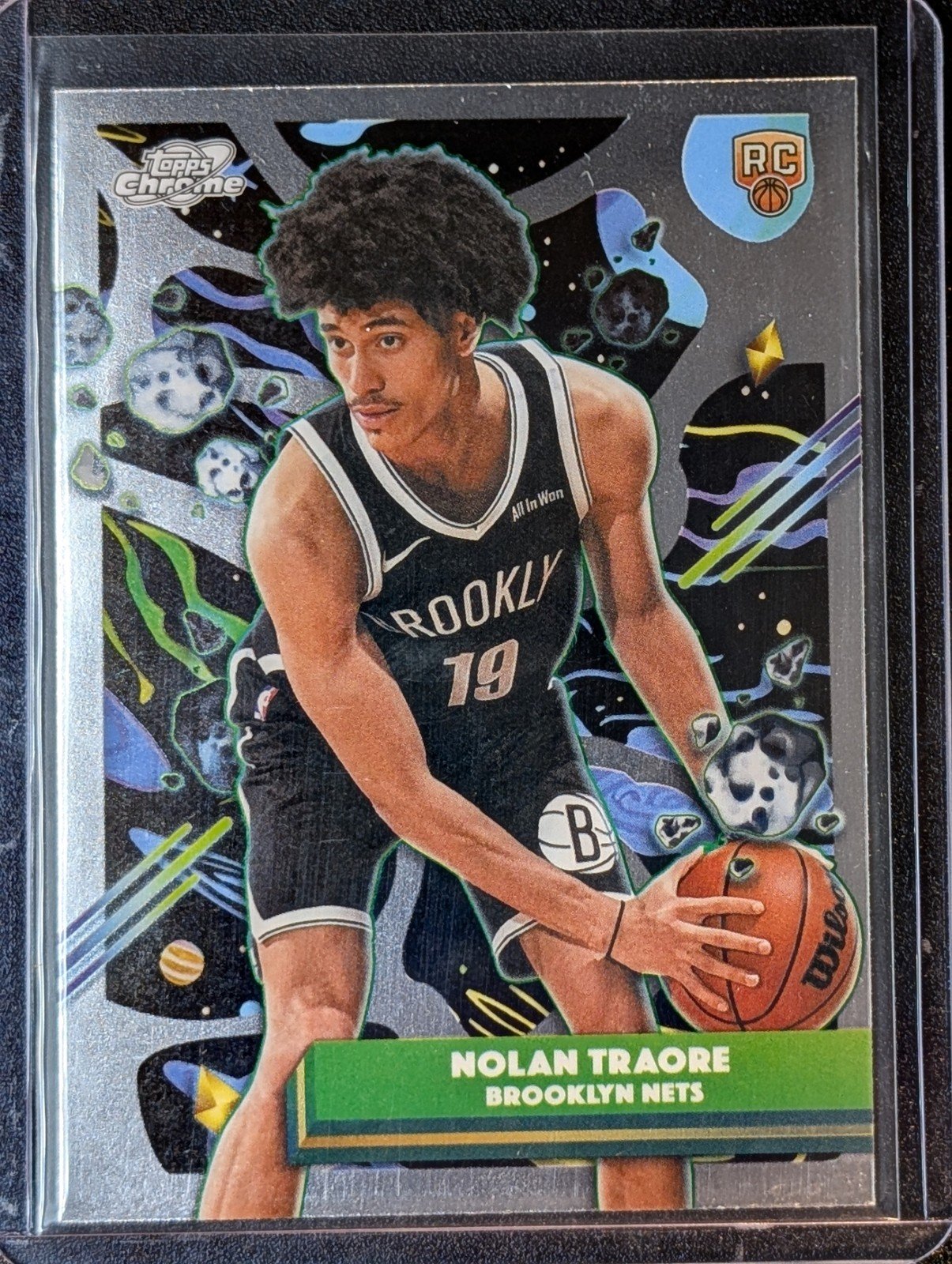 Front of 2025-26 Topps Chrome Cosmic #187 Nolan Traore RC