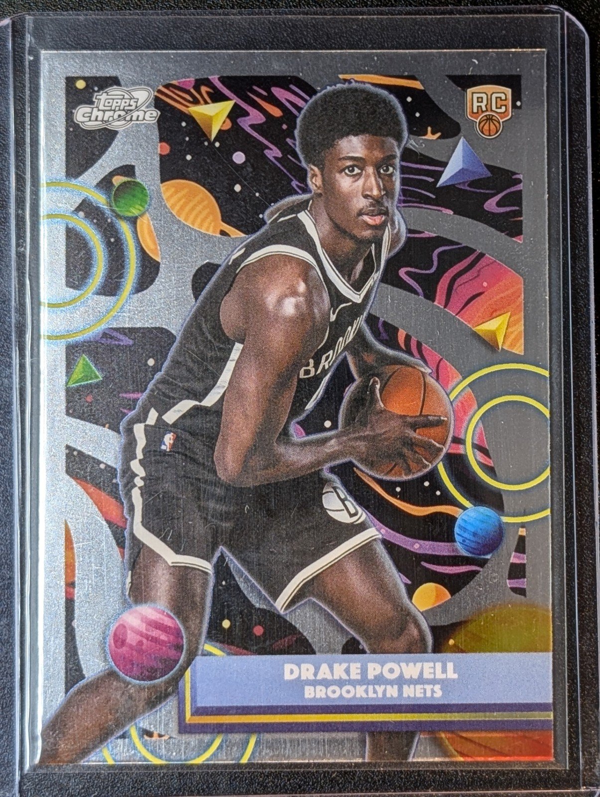Front of 2025-26 Topps Chrome Cosmic #61 Drake Powell RC