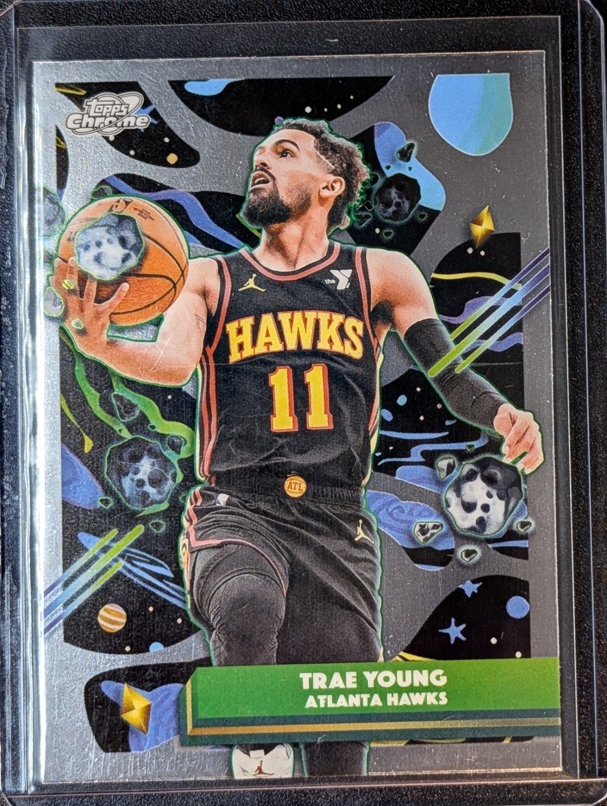 Front of 2025-26 Topps Chrome Cosmic #15 Trae Young