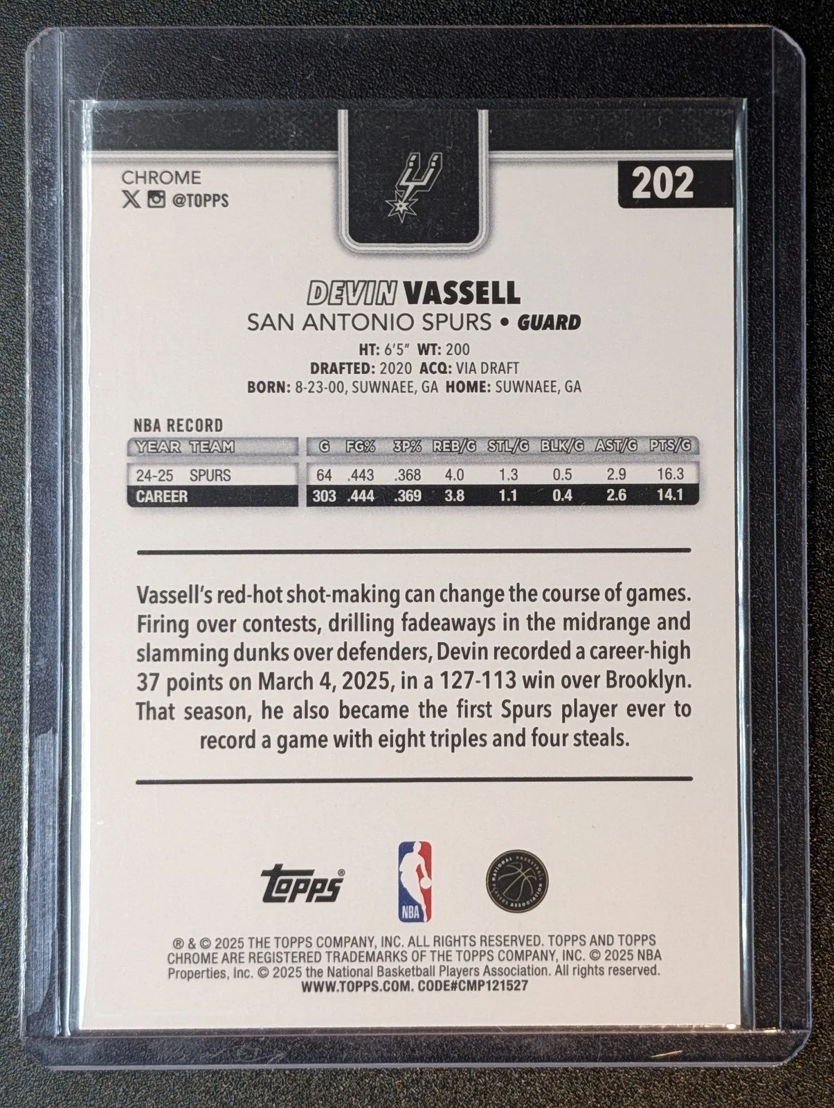 Back of 2025-26 Topps Chrome #202 Devin Vassell Red White and Blue Refractor