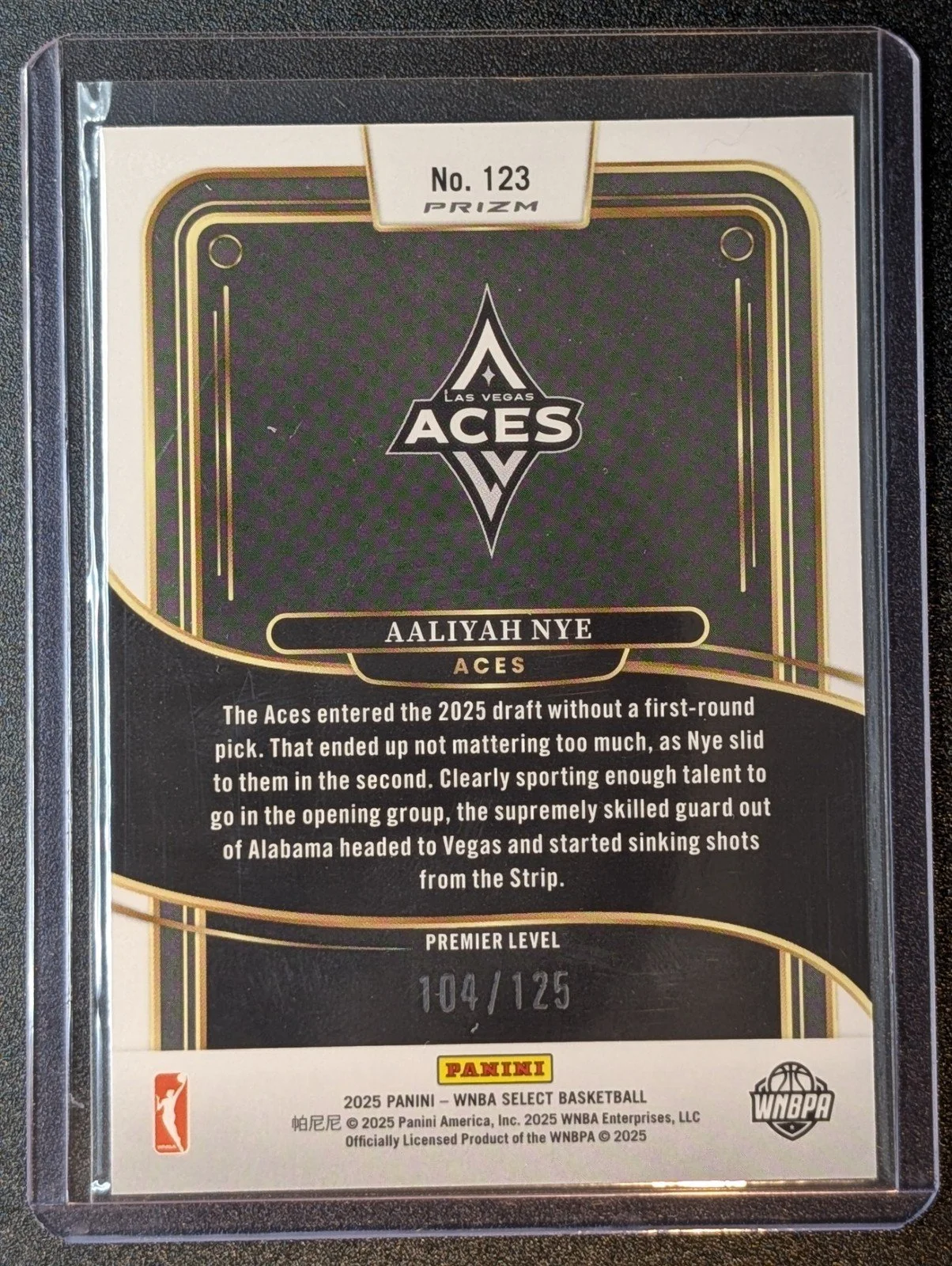 Back of 2025 Panini Select WNBA /125 Aaliyah Nye Orange Prizm #123 RC