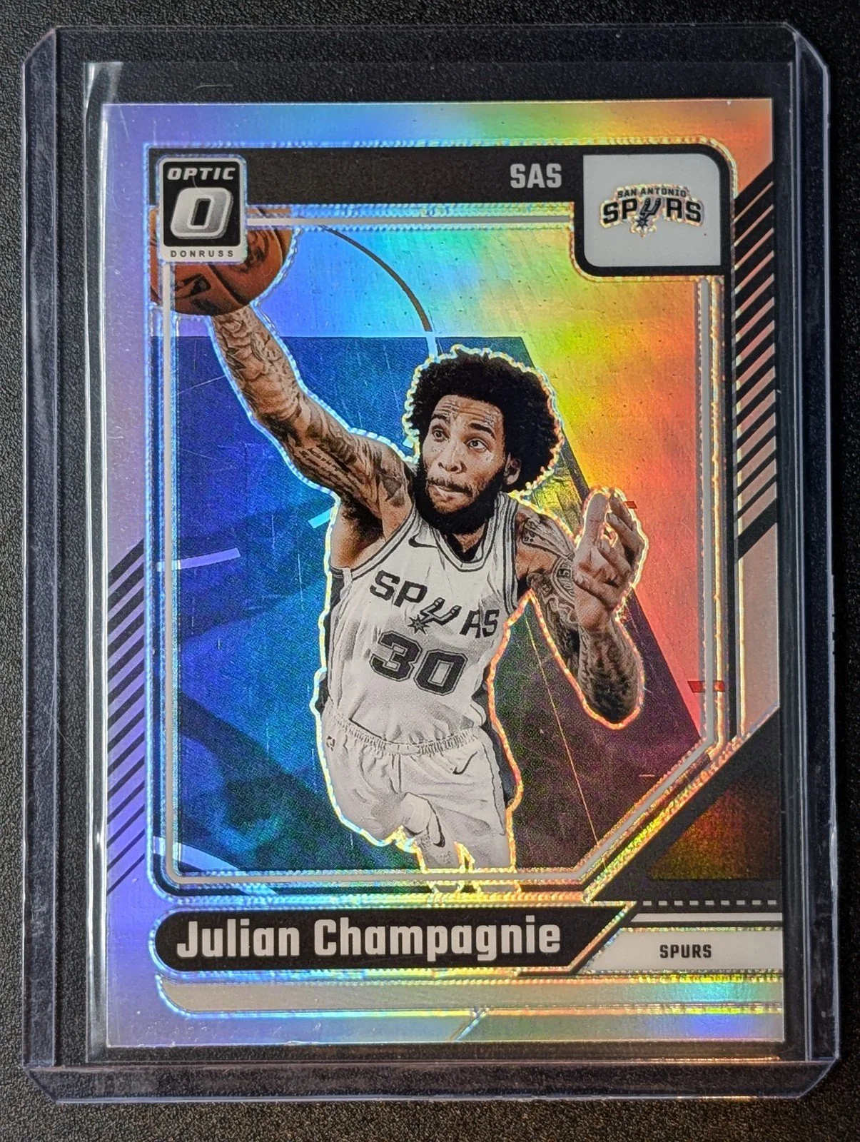 Front of 2024-25 Donruss Optic Julian Champagnie Holo Prizm Silver Spurs