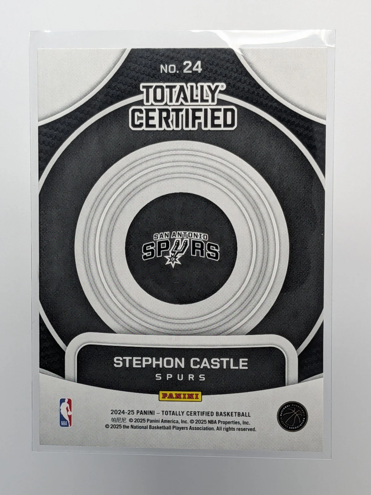 Back of 2024-25 Panini Totally Certified #24 Stephon Castle On Target Mirror RC