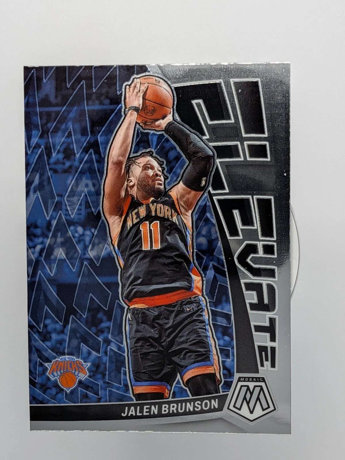 Front of 2022-23 Panini Mosaic #6 Jalen Brunson Elevate Mosaic