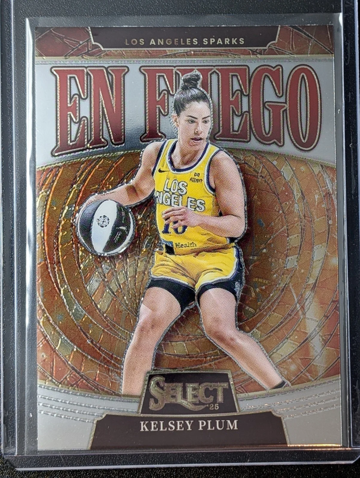 Front of 2025 Panini Select WNBA #12 Kelsey Plum En Fuego