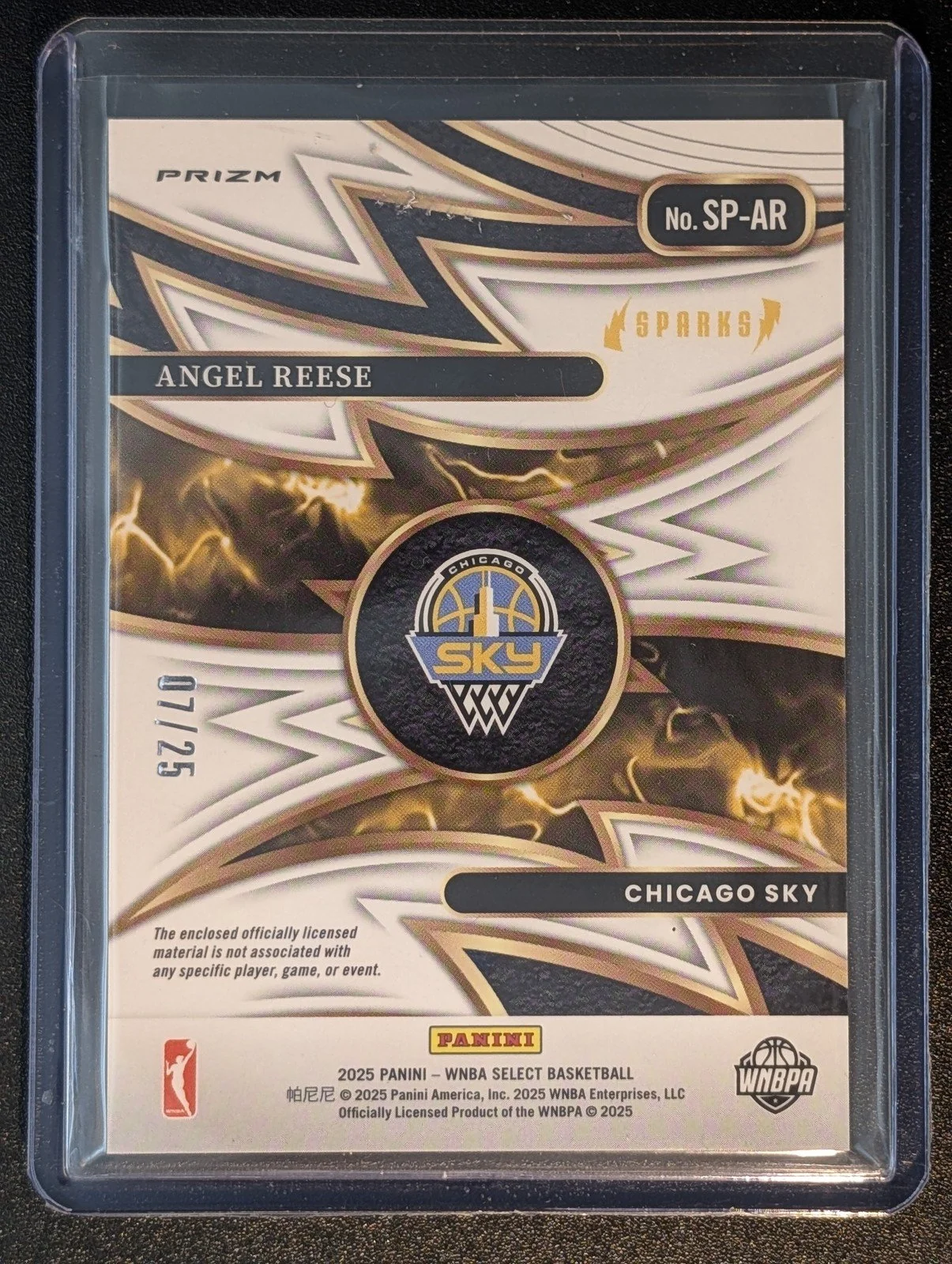 Back of 2025 Panini Select WNBA #SP-AR /25 Angel Reese Tie-Die patch 7/25