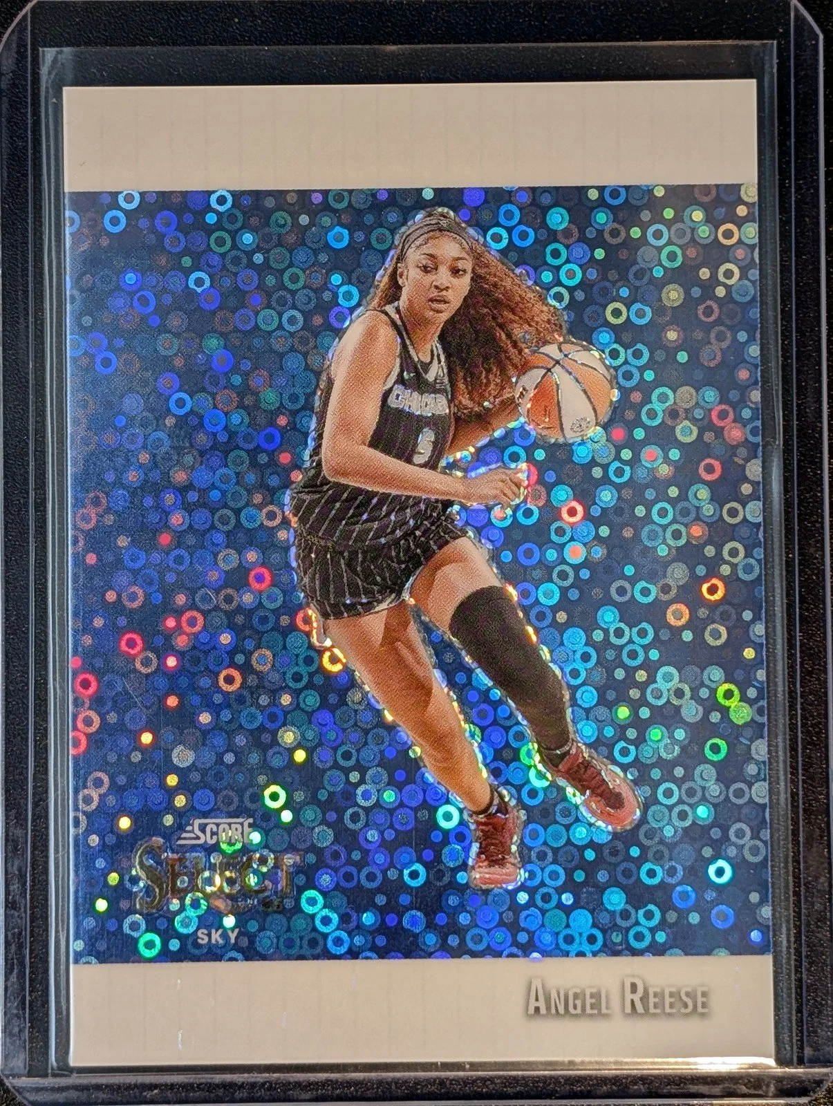 Front of 2025 Panini Select WNBA #6 Angel Reese Score Select Throwback Blue Disco /75