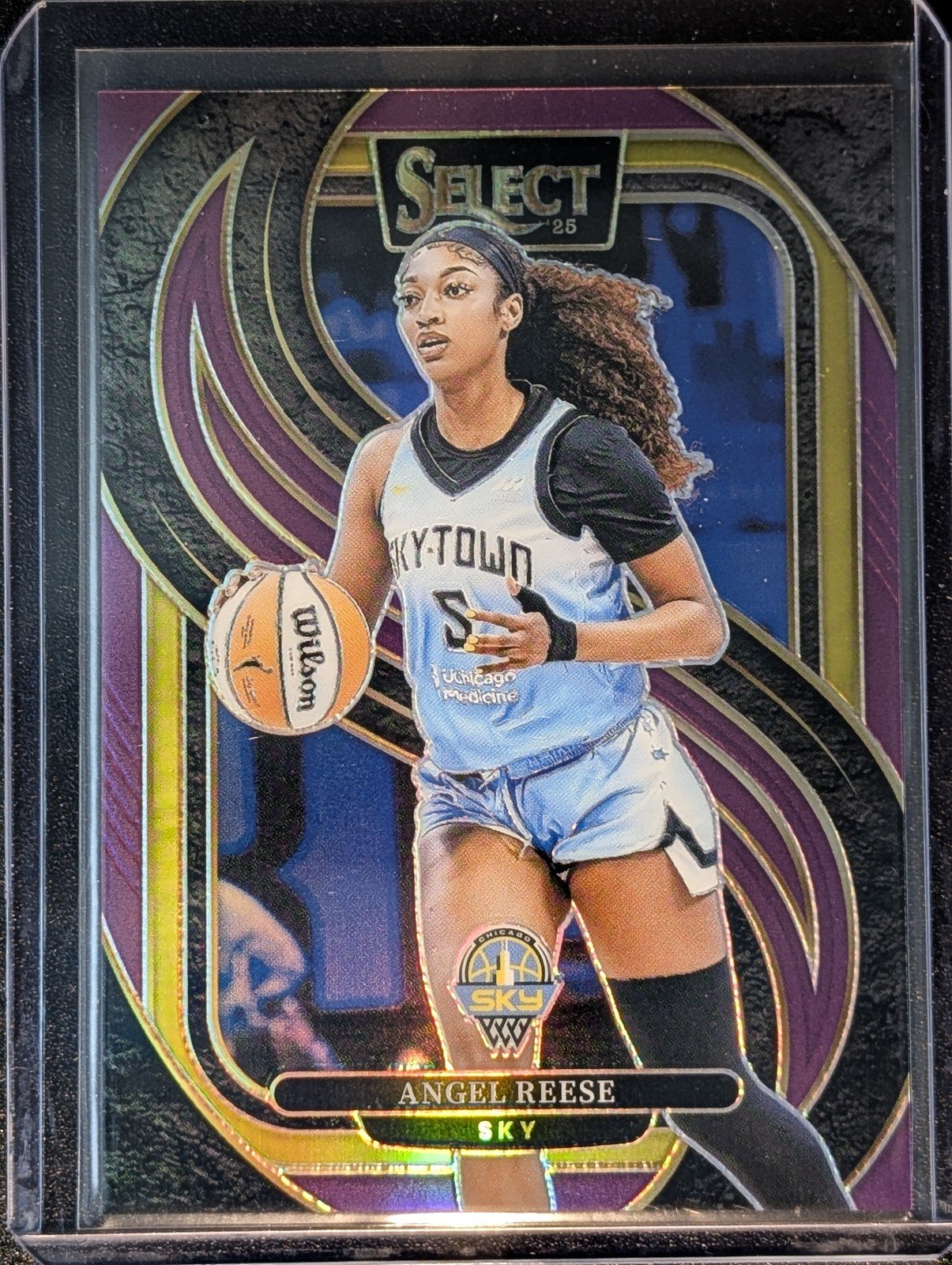 Front of 2025 Panini Select WNBA #170 Angel Reese Purple Prizms /149