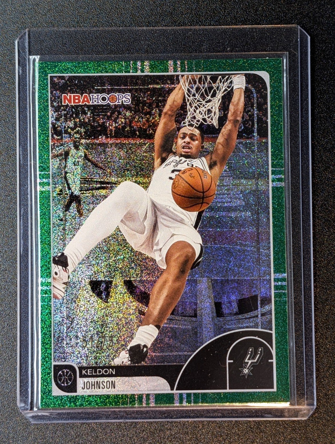 Front of 2025-26 Hoops #23 Keldon Johnson Green Pixel Burst /75