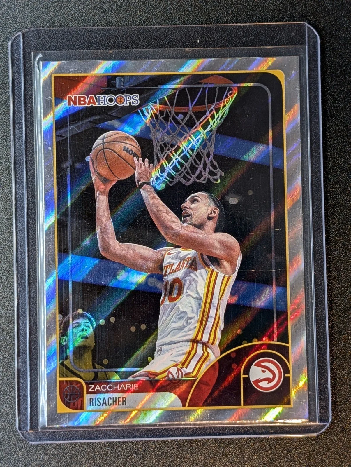 Front of 2025-26 Hoops #105 Zaccharie Risacher Light Burst