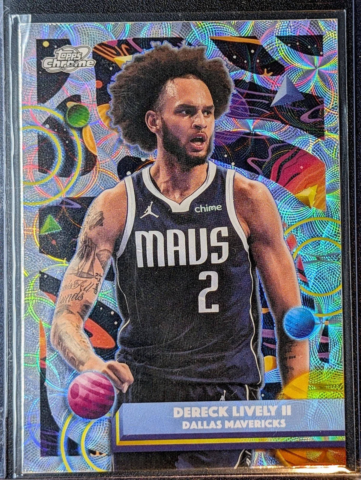 Front of 2025-26 Topps Chrome Cosmic #10 Dereck Lively II Nucleus Refractors
