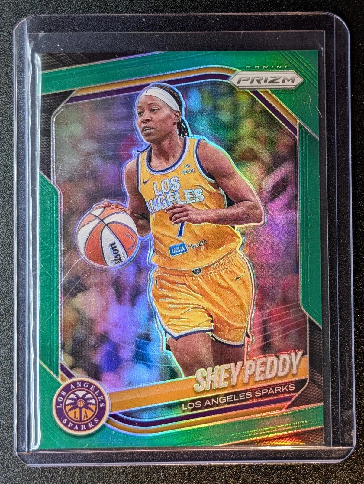 Front of 2025 Panini Prizm WNBA #136 Shey Peddy Prizms